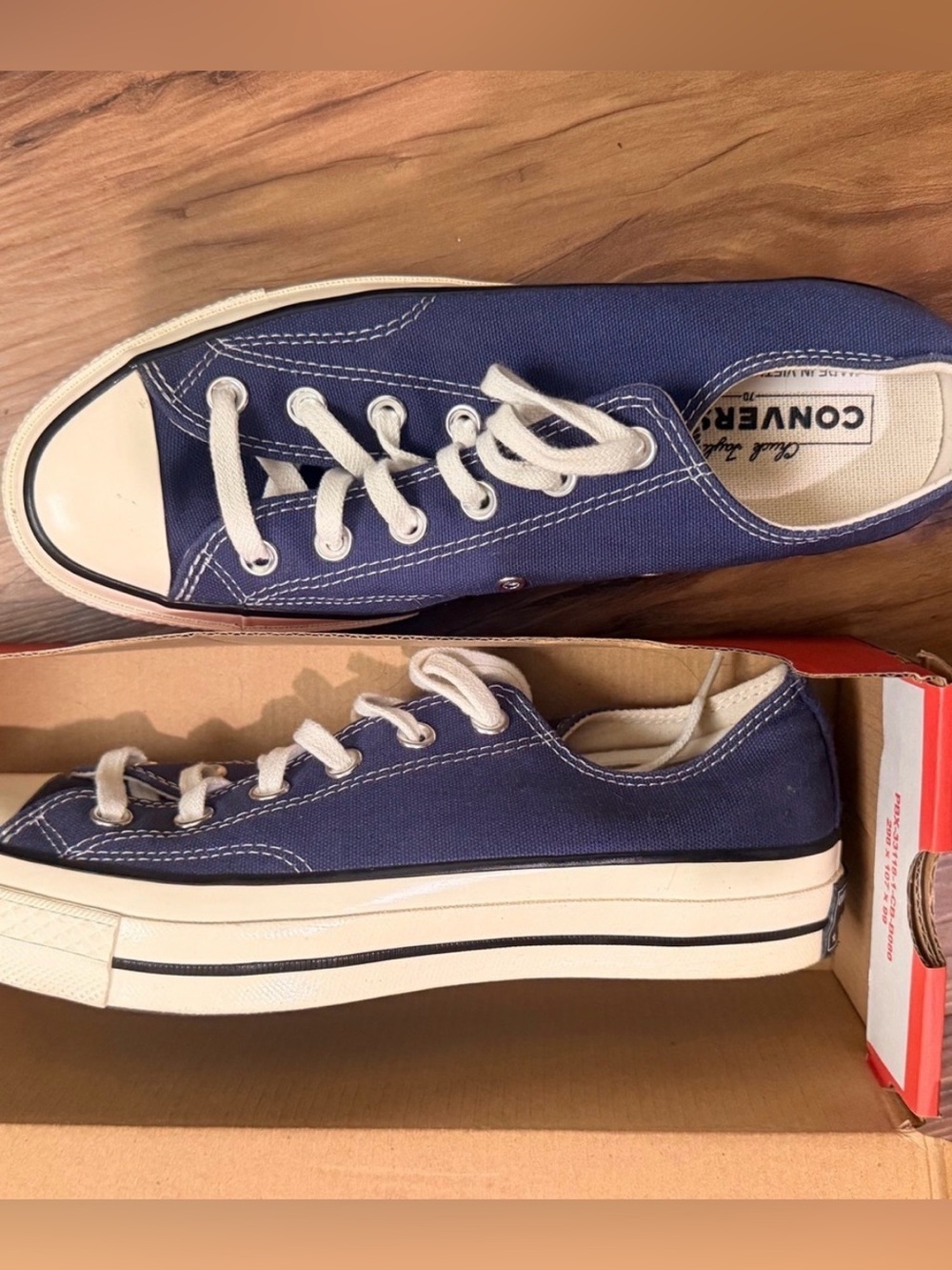 Converse women’s Low Top Canvas Sneakers in Blue and White